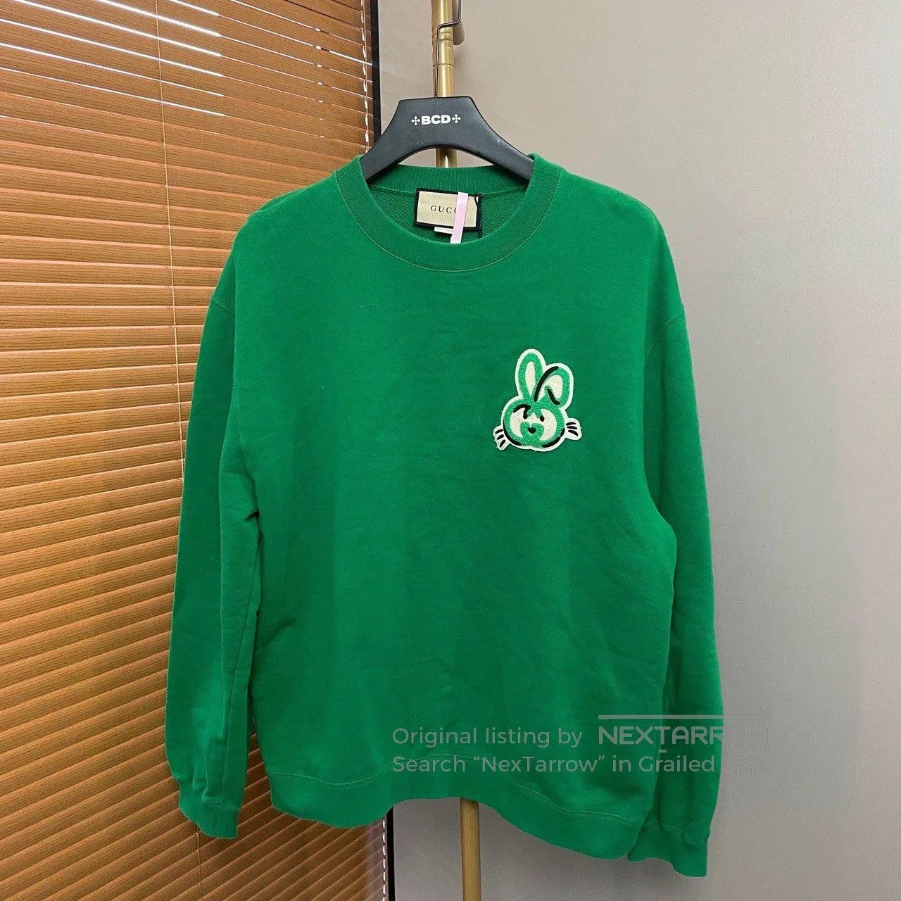 gucci green sweatshirt with bunny design.
