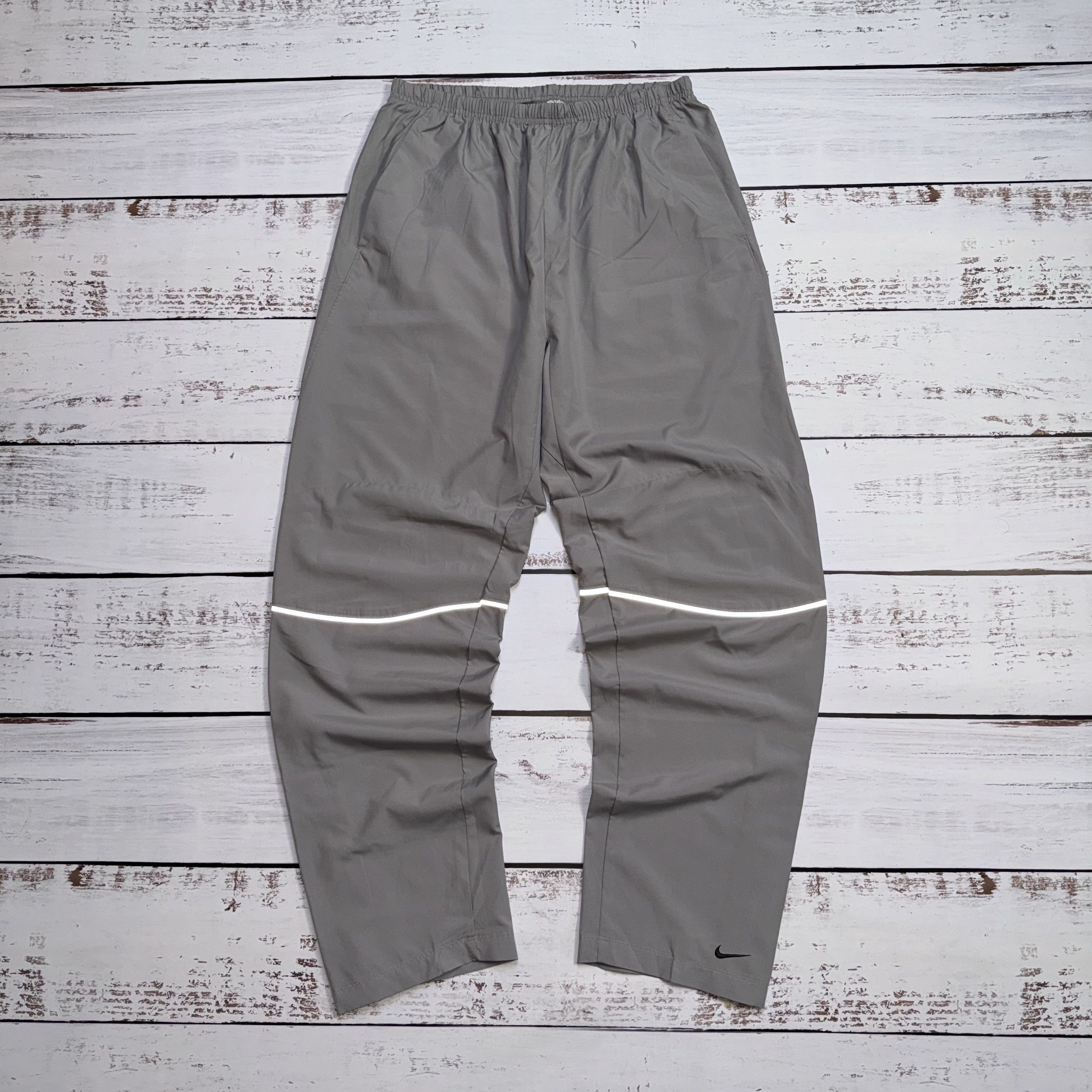 Nike reflective pants hot sale