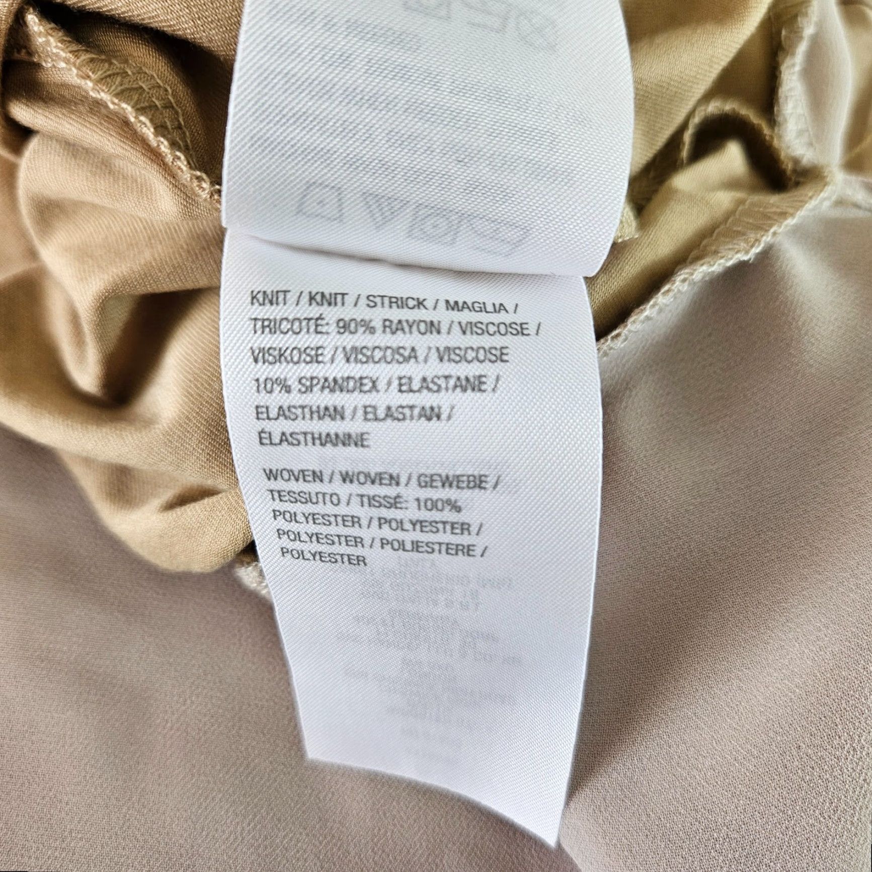 Vintage LOGO Lori Goldstein Womens Top Sz Large Tan 3/4 Sleeve Asymmetrical Hem Blouse Knit Shirt Womens Large Tan 3/4 Sleeve LOGO by Lori Goldstein Size L / US 10 / IT 46 - 4 Thumbnail