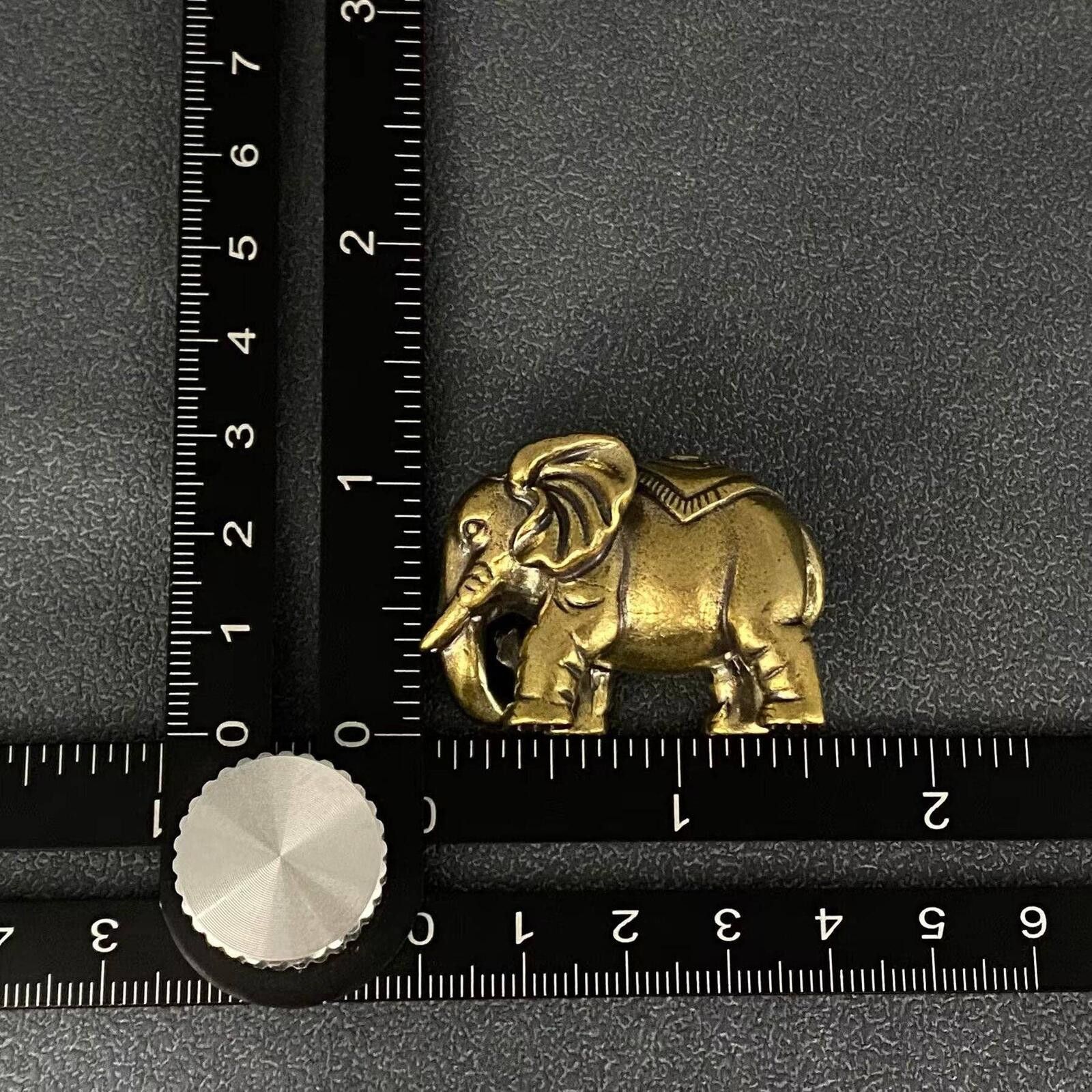 The Unbranded Brand Small Brass Elephant Trunk Down Figurine with Saddle Size ONE SIZE - 2 Thumbnail