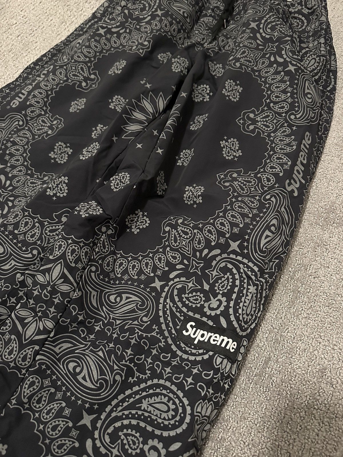 Supreme 2026 SUPREME REFLECTIVE BANDANA TRACK PANTS | Grailed