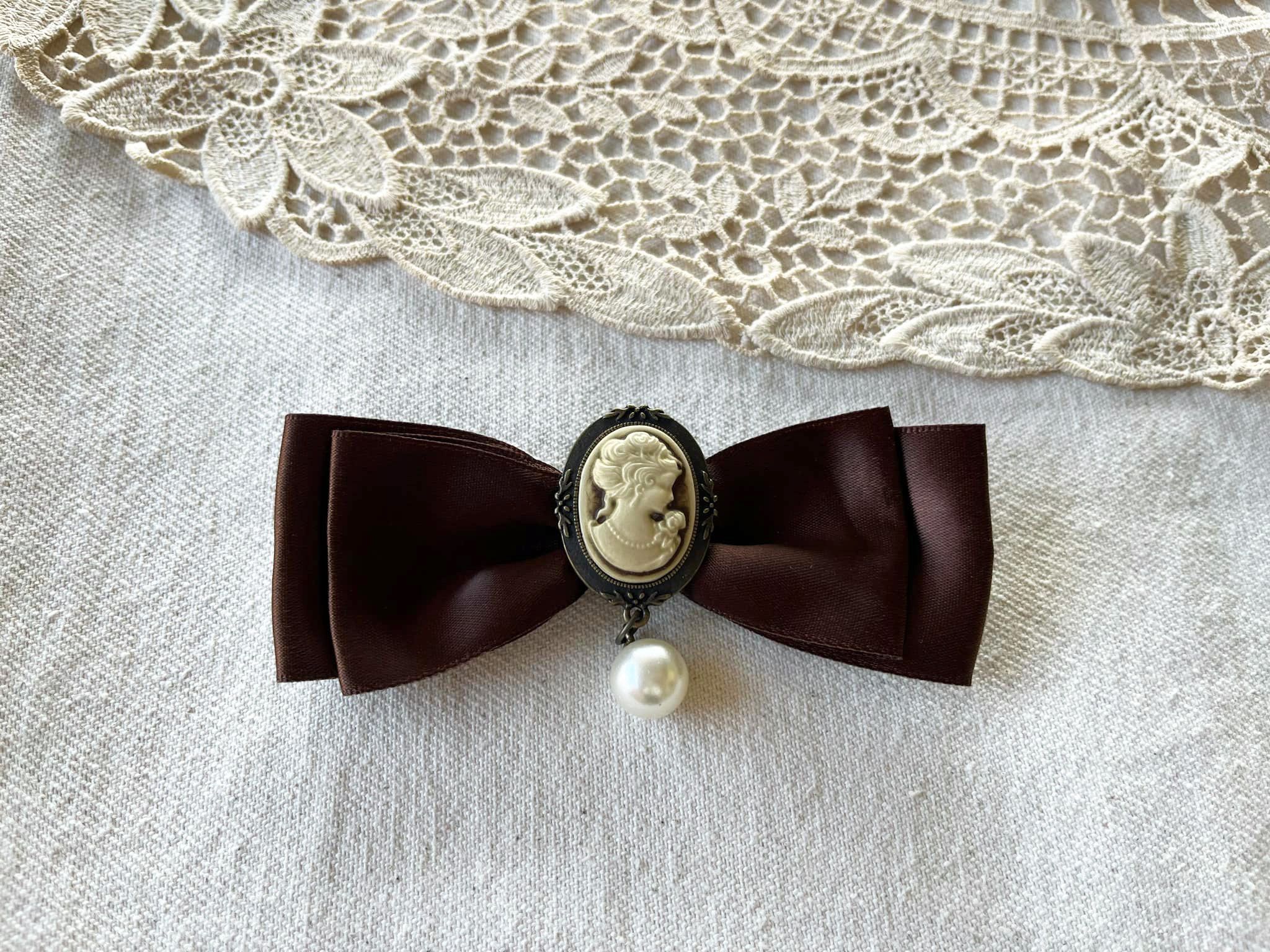 Vintage Brown Satin Ribbon Brooch With Cameo and dangling pearl Size ONE SIZE - 1 Thumbnail