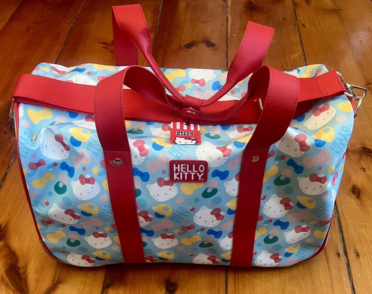 Japanese Brand × Other Authentic Hello Kitty duffle roller travel luggage bag rare Size ONE SIZE - 1 Thumbnail