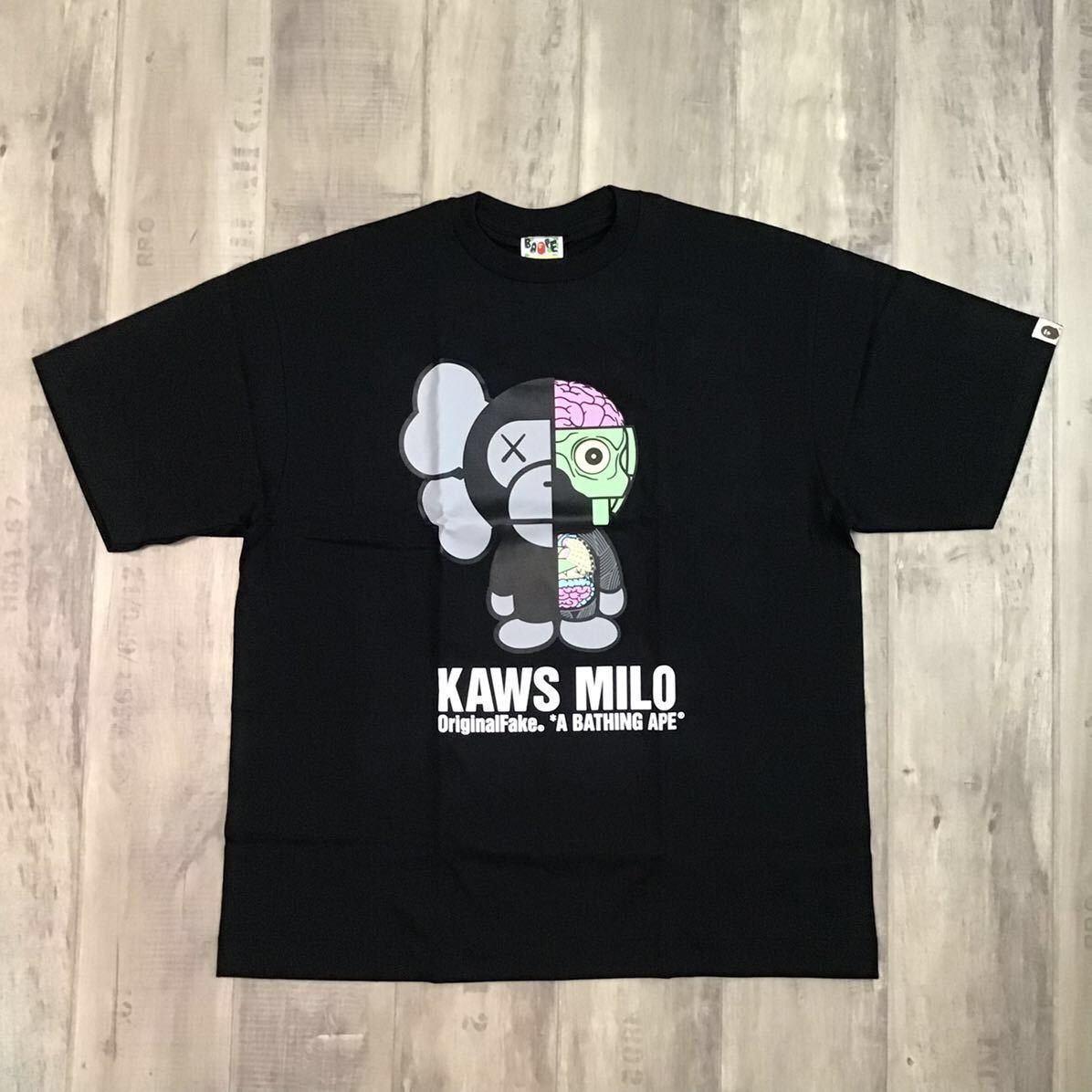 image of Bape × Original Fake Kaws Milo Companion T-Shirt Ape Nigo in Black, Men's (Size XL)