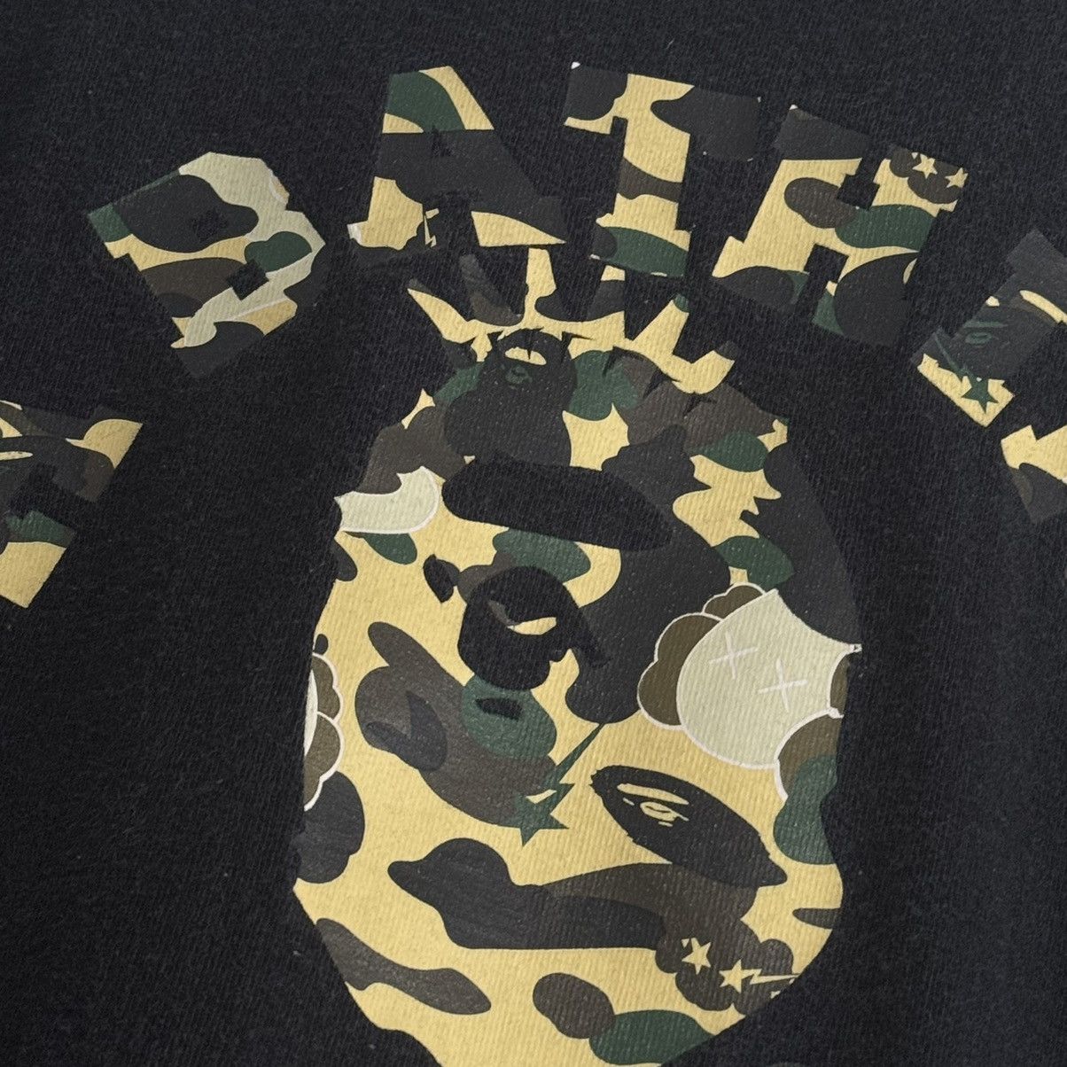 Bape × Kaws OG Bendy Color Camo College Logo Tee NYC Size US L / EU 52-54 / 3 - 5 Thumbnail