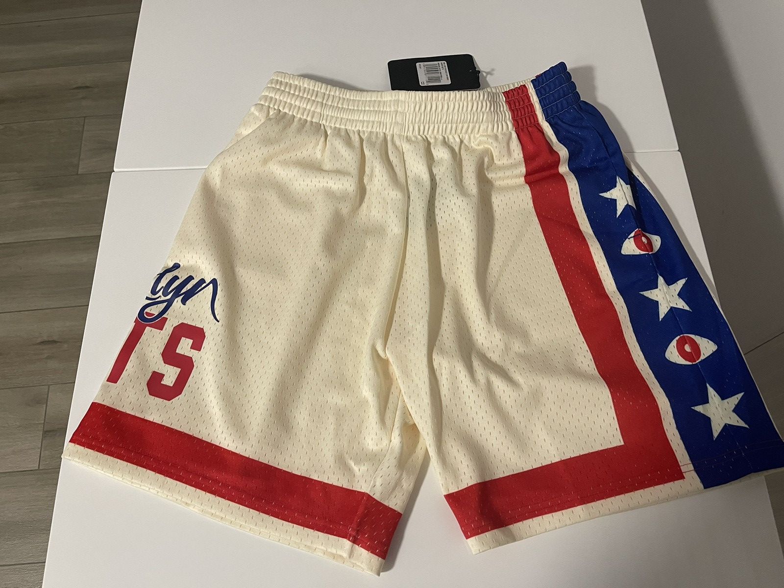 image of Mitchell & Ness X Joey Bada$$ Brooklyn Nets Swingman Shorts in Beige, Men's (Size 34)