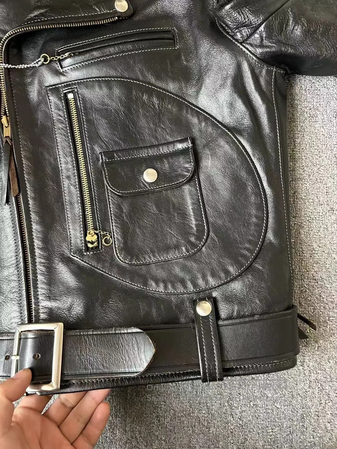 The Real McCoy's black leather motorcycle jacket with houndstooth lining. Size US S / EU 44-46 / 1 - 4 Thumbnail