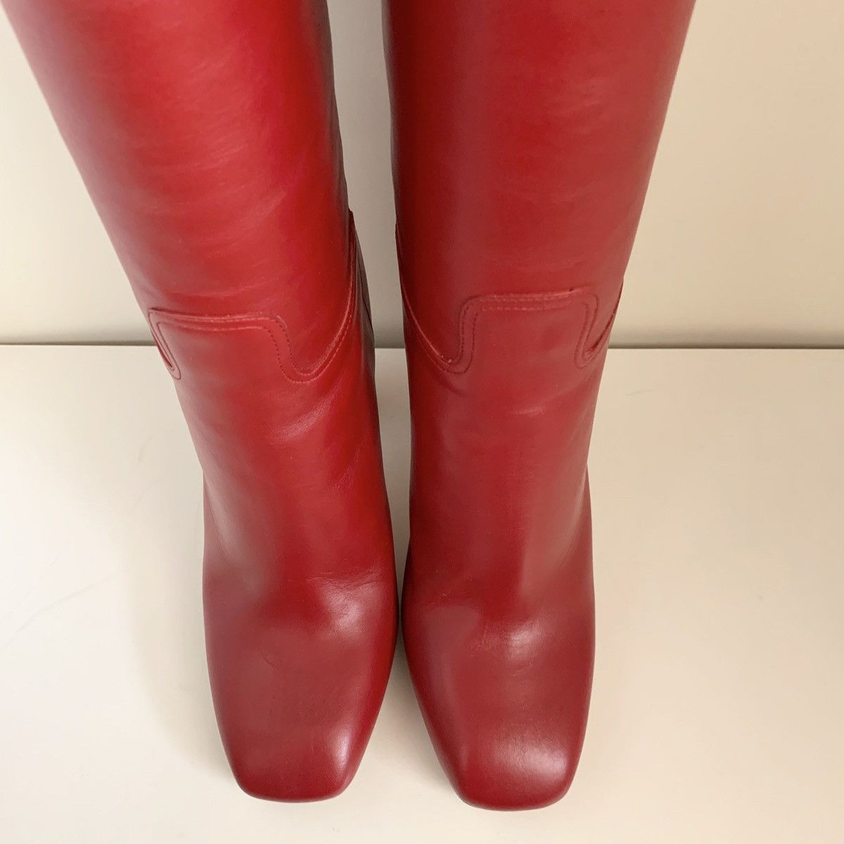 Red calfskin knee boots