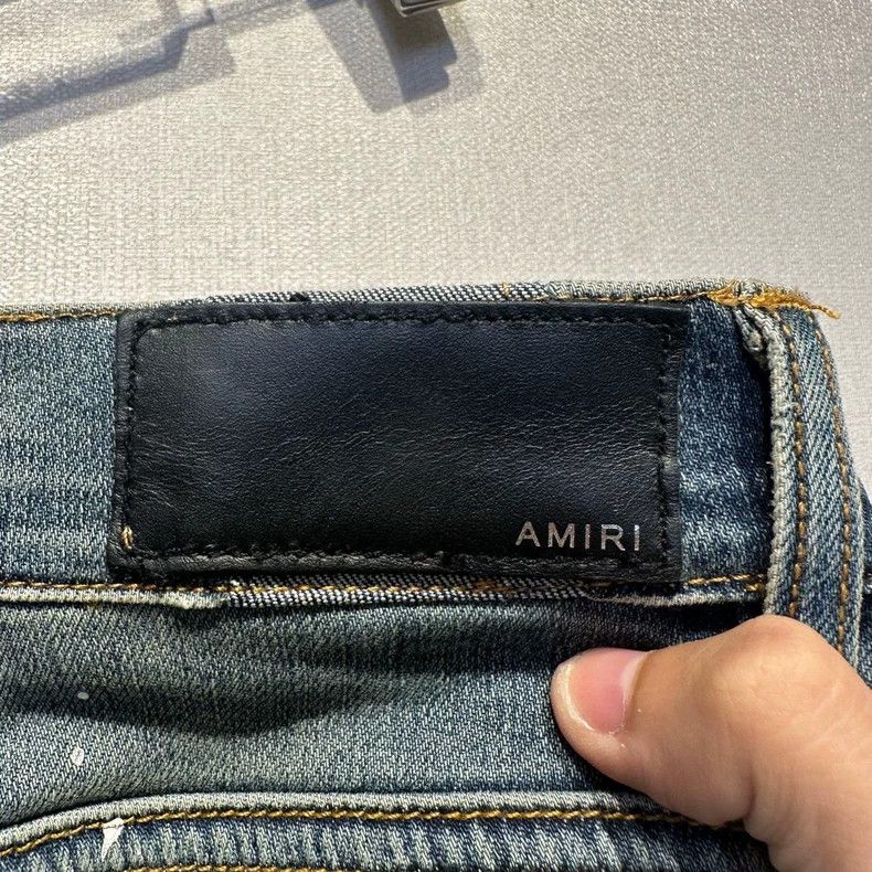 Amiri Vintage Multi-Element Badge Washed Destroyed Jeans