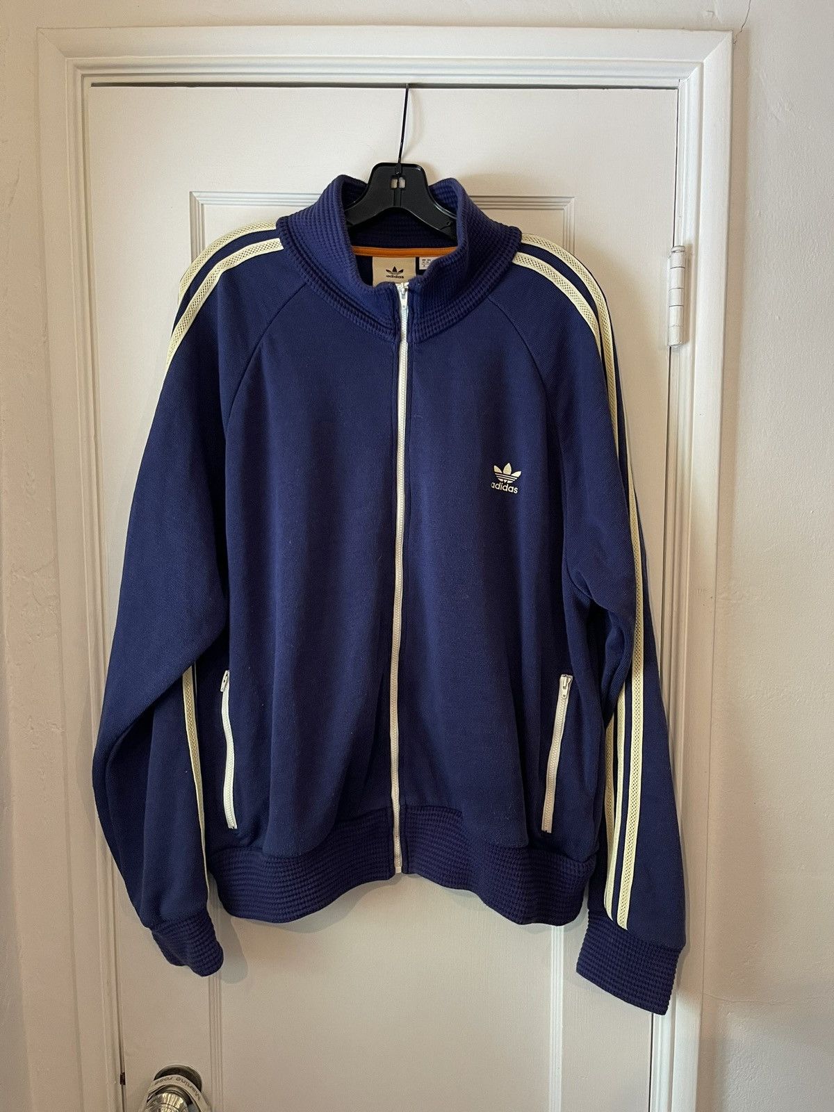 Crochet trimmed knitted track jacket