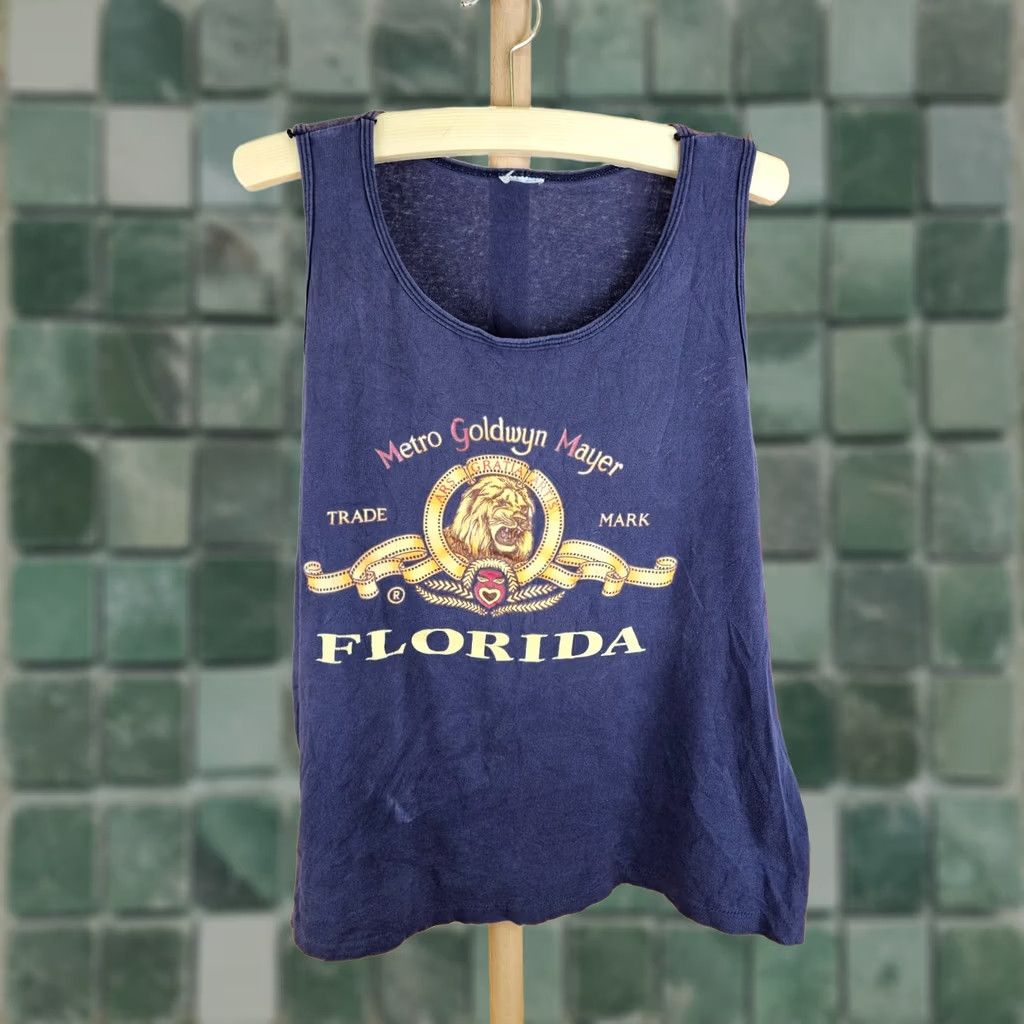Etro VINTAGE MGM METRO GOLDWYN MAYER SINGLE STITCH BLACK TANK TOP SZ XLARGE Shirt Men XL Black 90s MGM Retro Sleeves Short Crew Neck Tank Top Size US XL / EU 56 / 4 - 1 Thumbnail