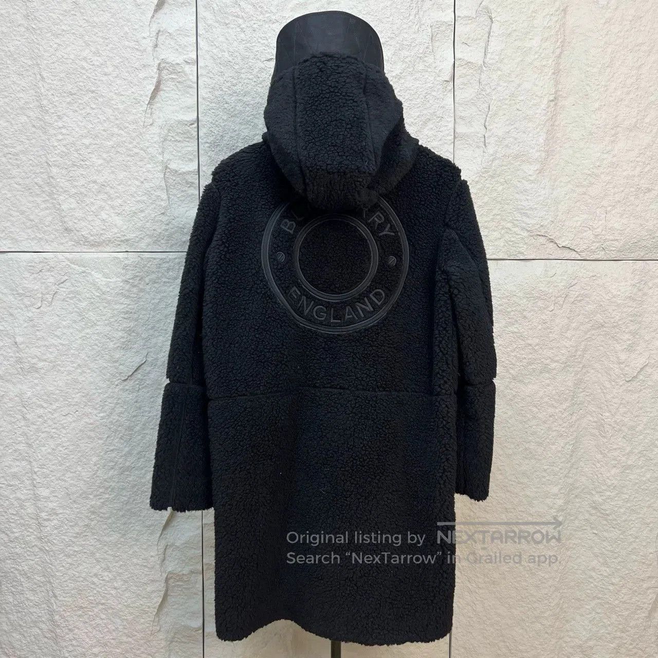 black lamb fur coat by burberry.
