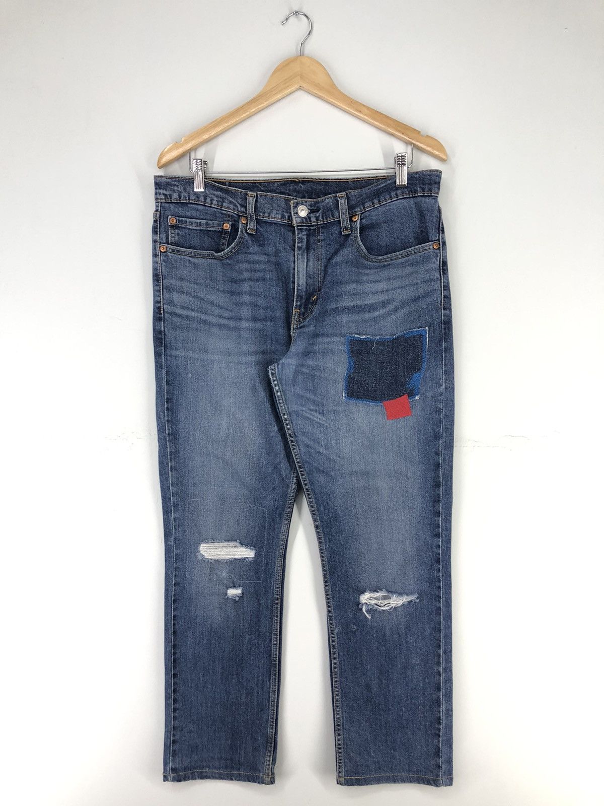 image of Distressed Denim x Levis Vintage Levis 511 Patchwork Distressed Faded Blue Jeans, Men's (Size 34)