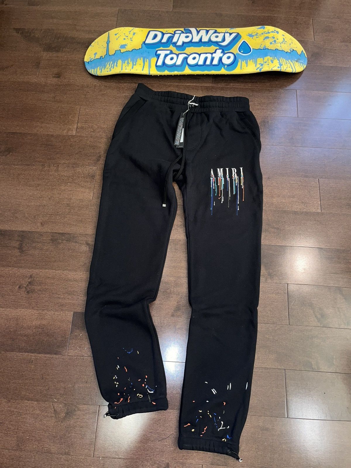 image of Amiri Black Paint Drip Sweatpants, Men's (Size 38)