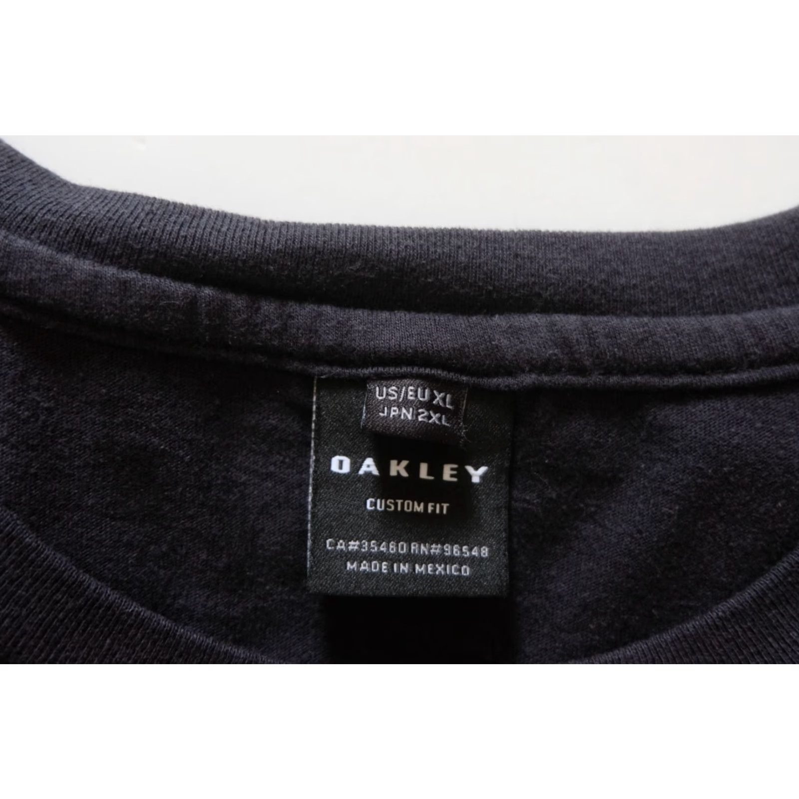 Oakley OAKLEY VTG Y2K RETRO 90s CORE ESSENTIAL LOGO GRAPHIC BLACK T SHIRT XL MEN Sz XL 22" PIT TO PIT 28" LENGTH Size US XL / EU 56 / 4 - 8 Thumbnail