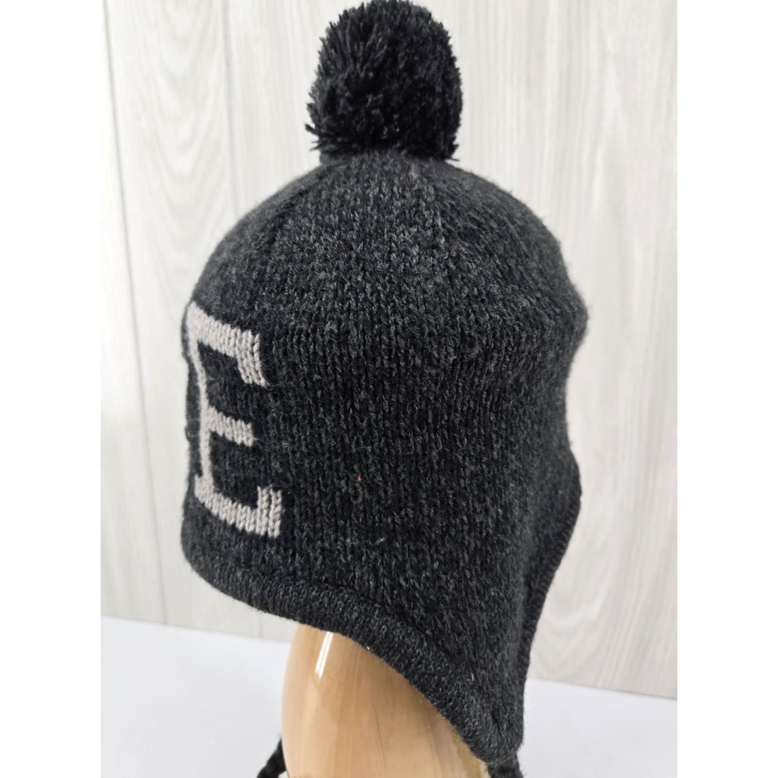 American Eagle Outfitters Y2K American Eagle AE Knit Beanie Hat Pom Pom Tassels Trapper Style Black Gray Unisex Adults One Size Beanie Winter Fall Logo Embroidered Tassled Size ONE SIZE - 4 Thumbnail