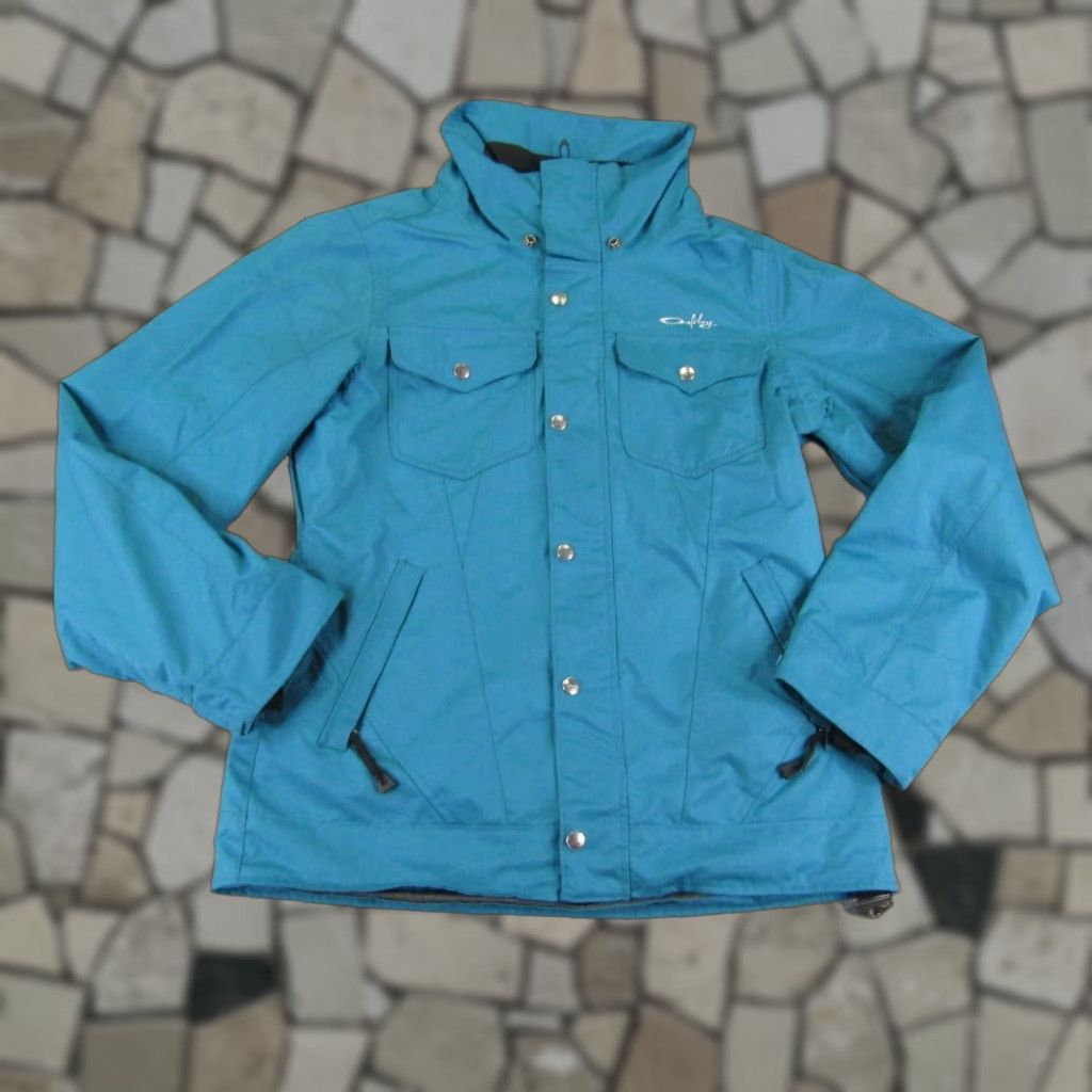 Oakley Jacket Womens Medium Blue Teal Snowboard Ski Waterproof Full Zip Up Coat Length Mid-Long Sleeve Shirt?