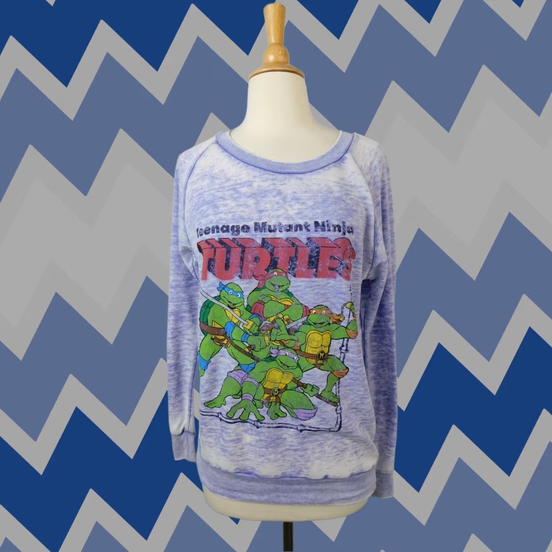 Vintage TMNT Sweatshirt Womens XS Purple TMNT 60% Cotton 40% Polyester Lavender Vintage-Look Crew Long Sleeve Sweatshirt - TMNT Theme Size XS / US 0-2 / IT 36-38 - 1 Thumbnail