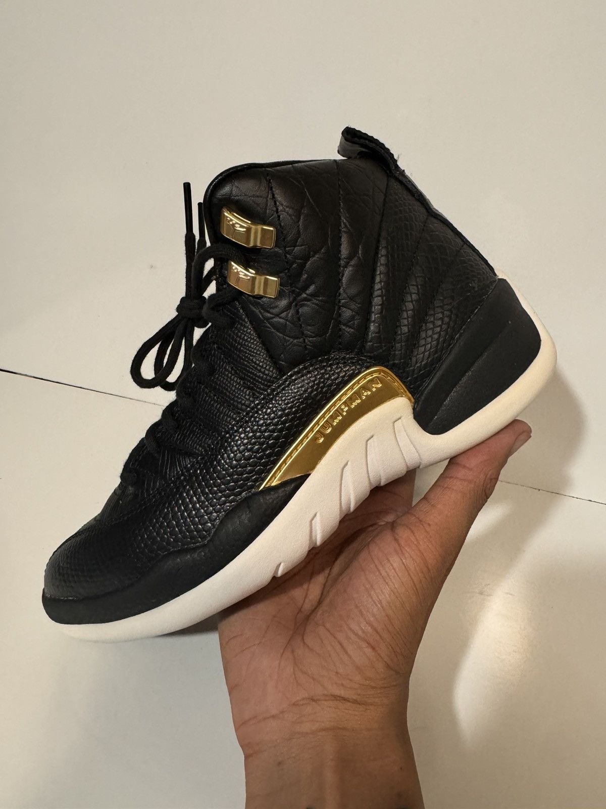 Jordan 12s reptile deals