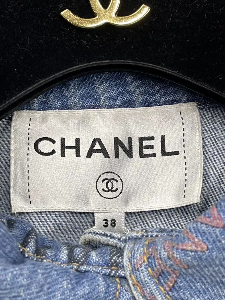 Chanel Logo denim jacket with graffiti