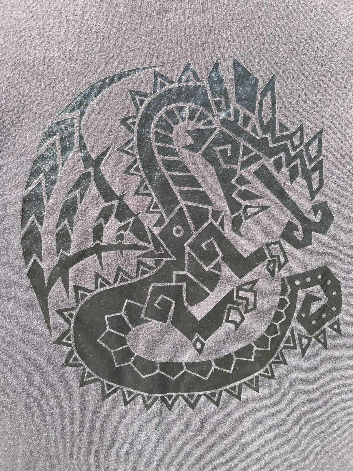 Uniqlo RARE🔥 Capcom Dragon Monster Hunter Size US L / EU 52-54 / 3 - 3 Thumbnail
