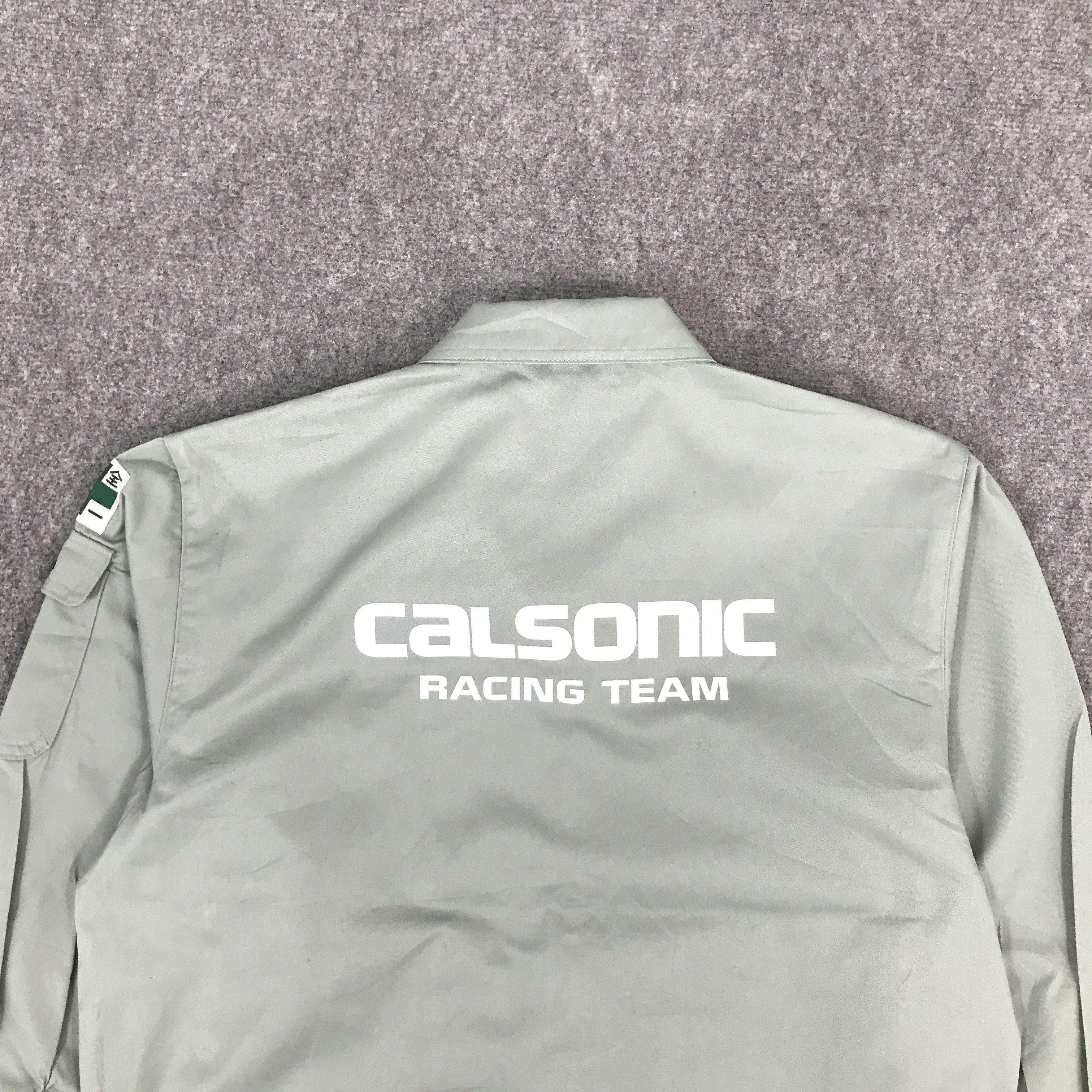 Japanese Brand × Sports Specialties CALSONIC RACING TEAM F1 NISSAN CUSTOM JACKET Size US M / EU 48-50 / 2 - 4 Thumbnail
