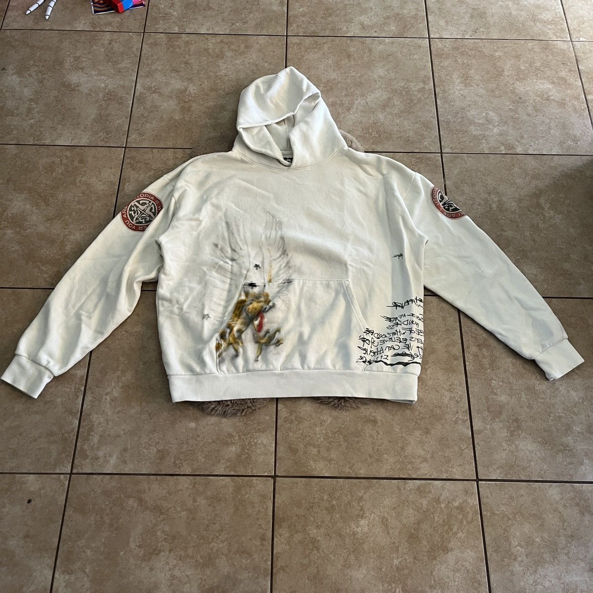 image of Travis Scott Utopia Circus Maximus Pullover Hoodie in White, Men's (Size 2XL)