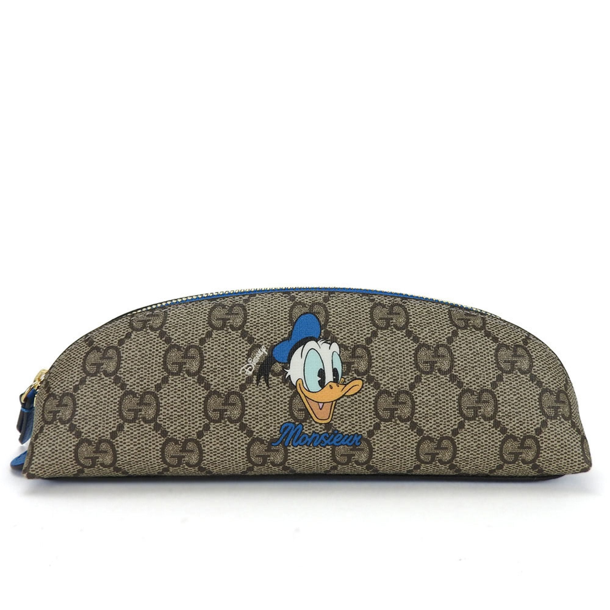 image of Gucci Pen Case 662129 GG Supreme Beige Blue Donald Duck Disney Collaboration Accessory in White, Wo