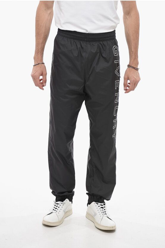 image of Givenchy Nylon Sweatpants With Side Contrasting Bands in Black, Men's (Size 34)