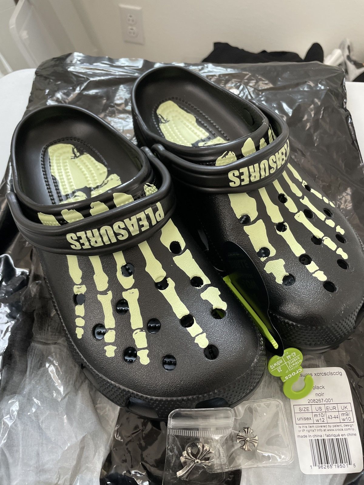 image of Skeleton Crocs Plus Jibbitz Shoes in Black, Men's (Size 10)