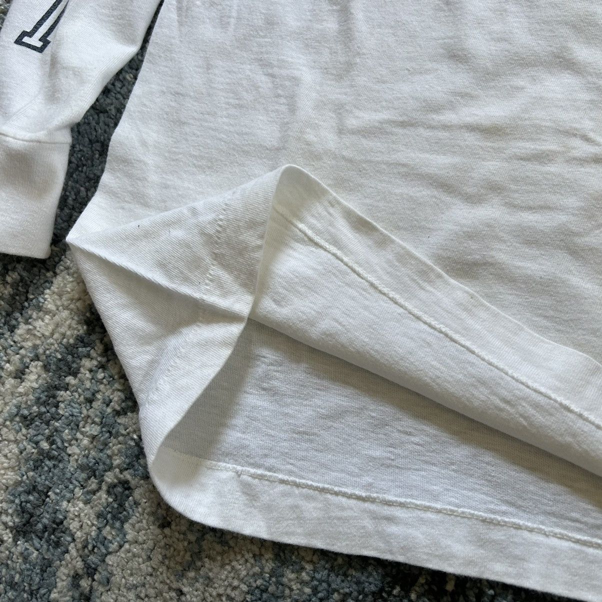 Jansport × NCAA × Vintage HiGH NECK HEAVYWEiGHT FiGHTiNG iLLiNi L/S TEE OFF WHiTE Size US S / EU 44-46 / 1 - 7 Thumbnail