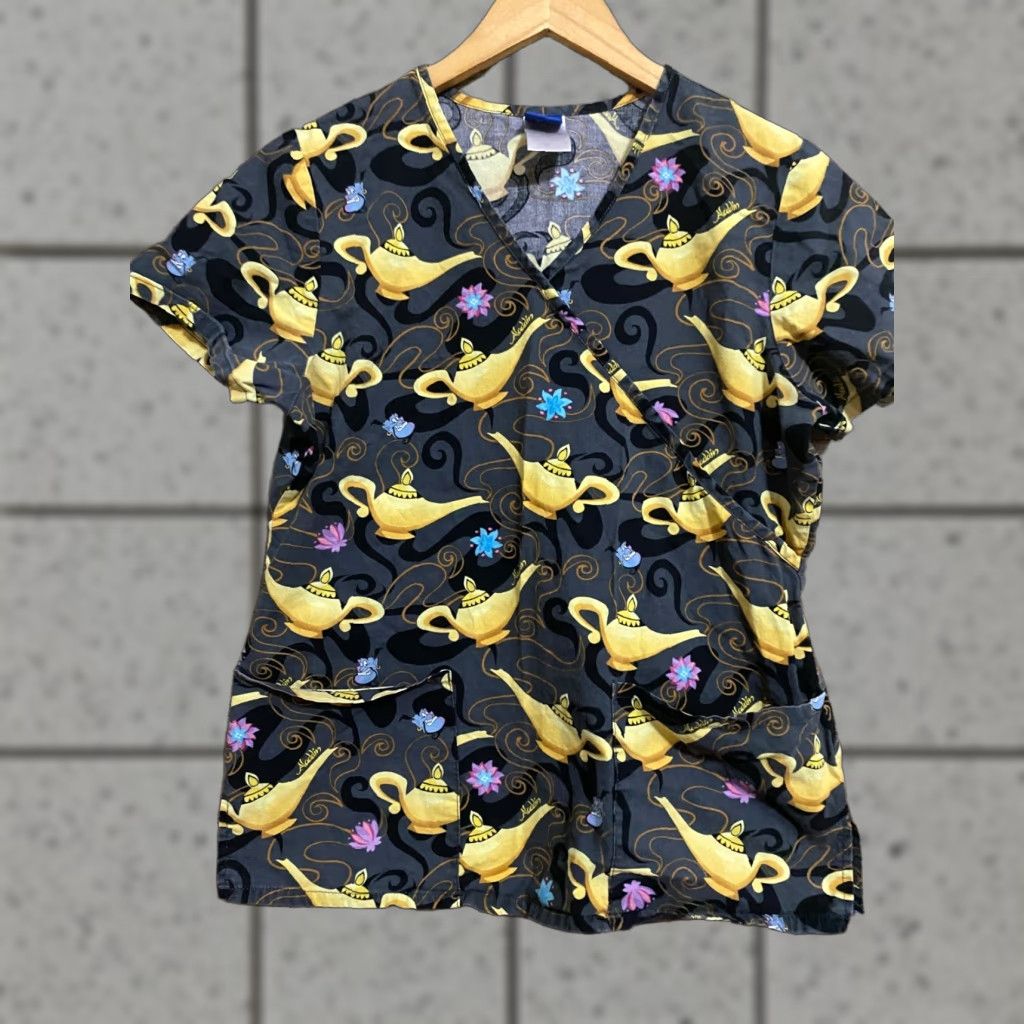 Disney Disney Scrub Top Women Small Disney's Aladdin Genie bottle Black Character Scrub Top Womens Size S / US 4 / IT 40 - 1 Thumbnail