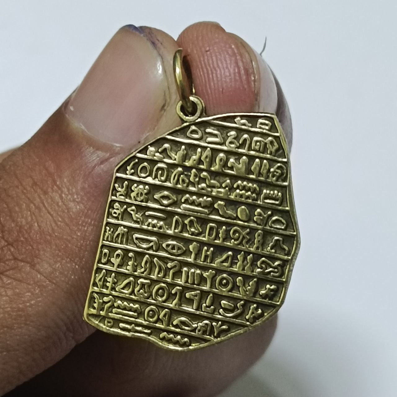 Copper Rosetta Stone pendant engraved Egyptian hieroglyphs