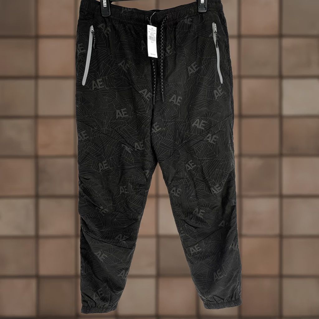 American Eagle Outfitters AMERICAN EAGLE OUTFITTERS AE NYLON JOGGER PANTS Men Medium Tapered Black & Gray Drawstring Activewear Pants Size US 31 - 1 Thumbnail