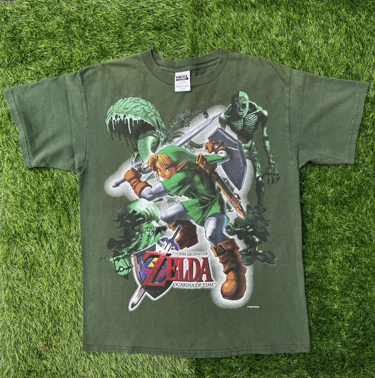 image of Nintendo x Vintage Zelda Ocarina Of Time Vintage Jumbo Print in Green, Men's (Size XL)