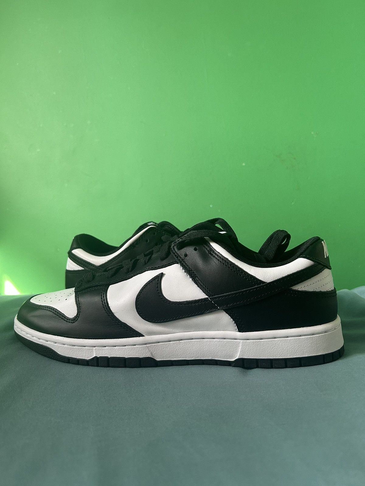 image of Nike Dunk Low Panda 2021 Shoes in Black, Men's (Size 13)