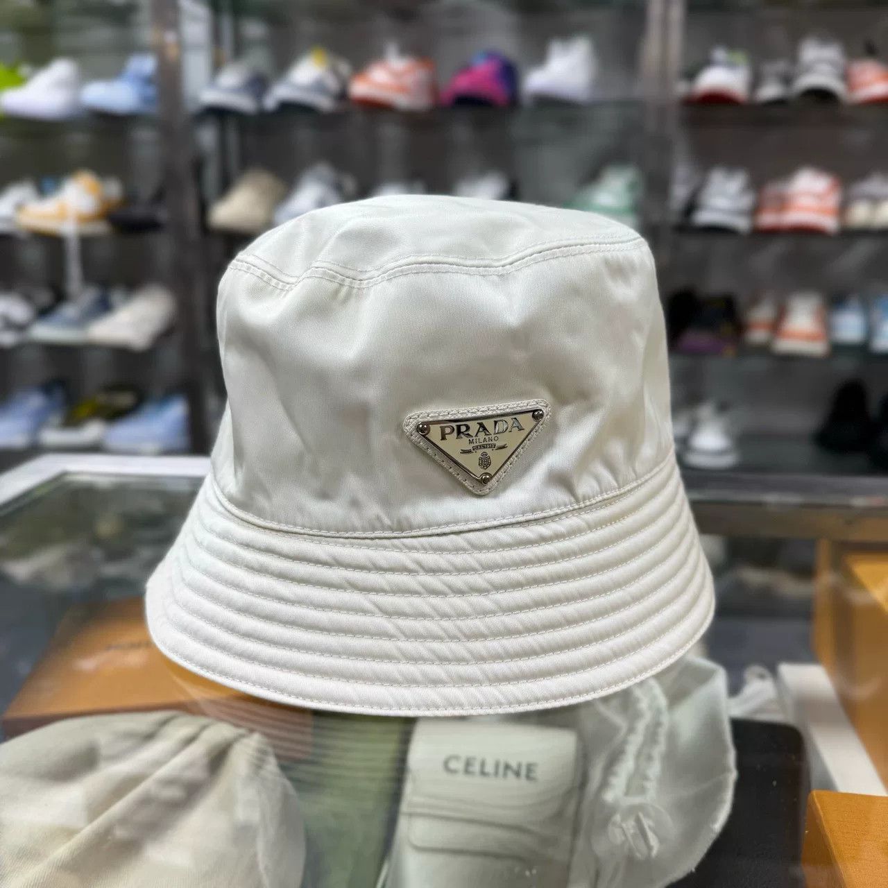 Prada Prada Metal Triangle Logo Beige Bucket Hat Size ONE SIZE - 1 Thumbnail