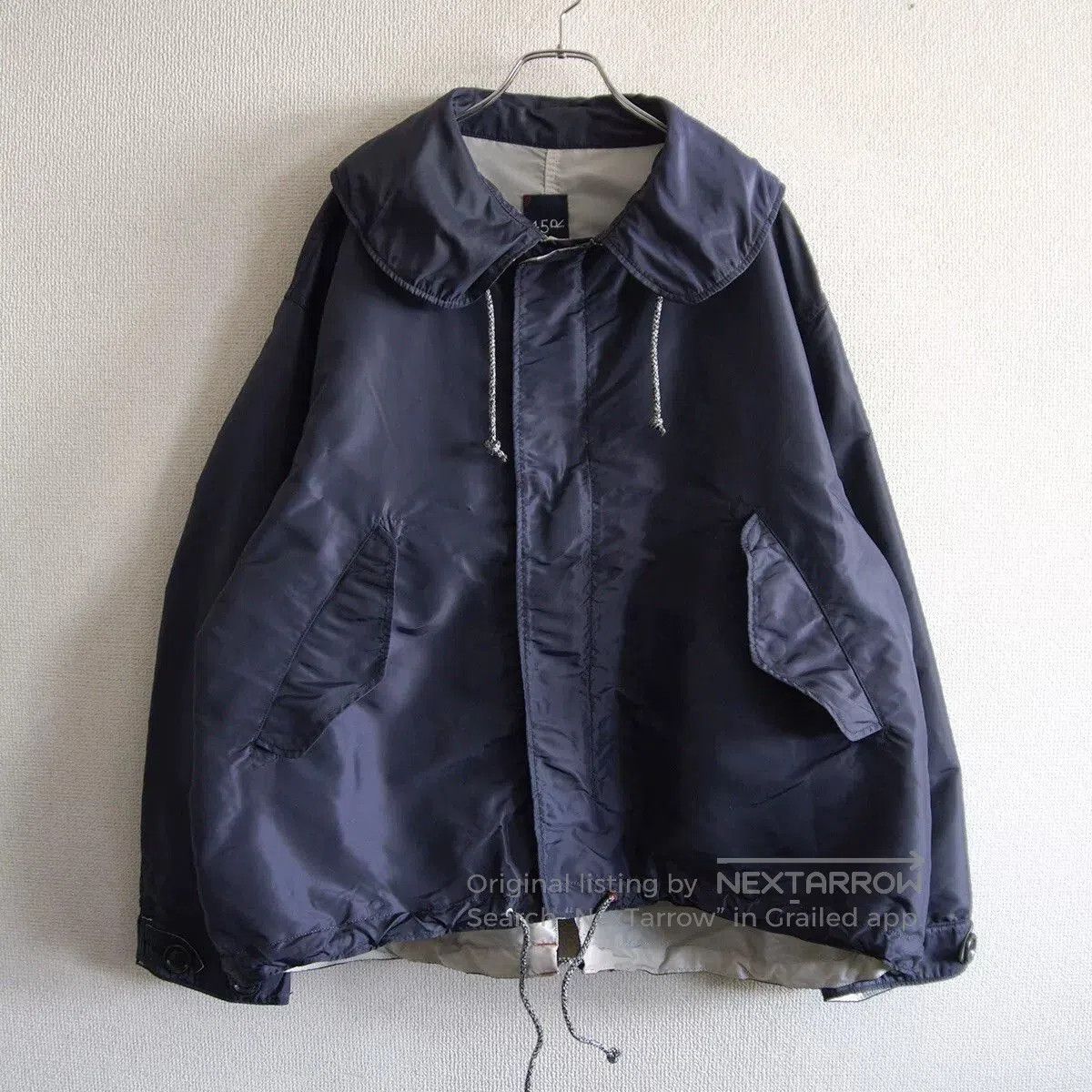 Blue Reversible Nylon Jacket.