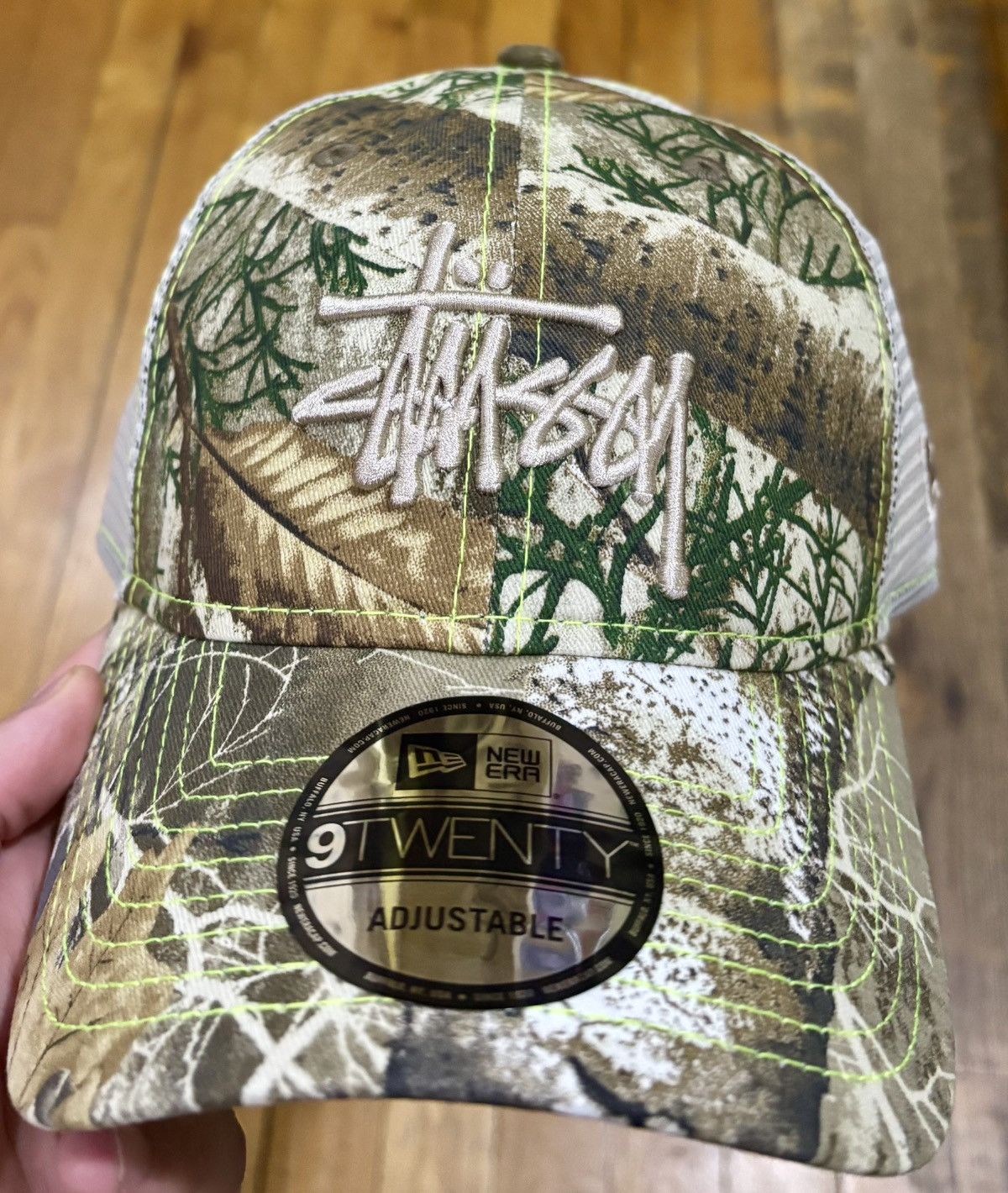 STUSSY REAL TREE EDGE CAMO NEW ERA 9TWENTY BASIC TRUCKER HAT