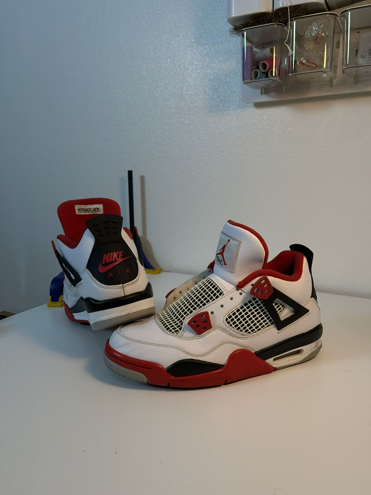 image of Jordan Nike Jordan 4 Fire Red (Gs) Shoes in Black, Men's (Size 7)