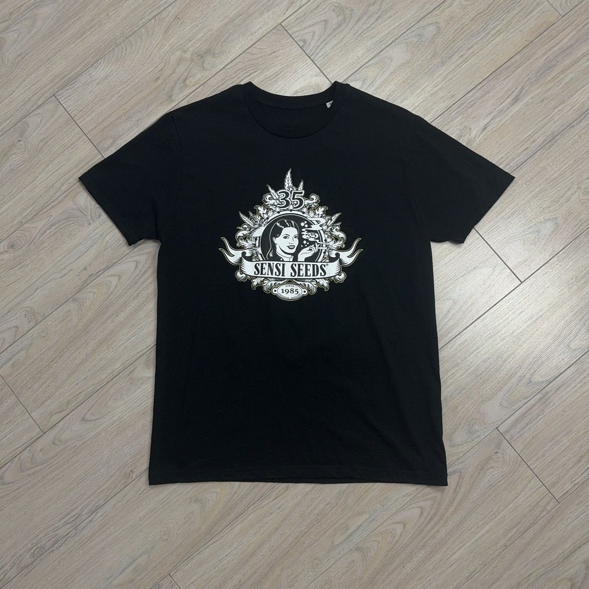 Band Tees Sensi Seeds Anniversary Black Tee Size US M / EU 48-50 / 2 - 1 Thumbnail