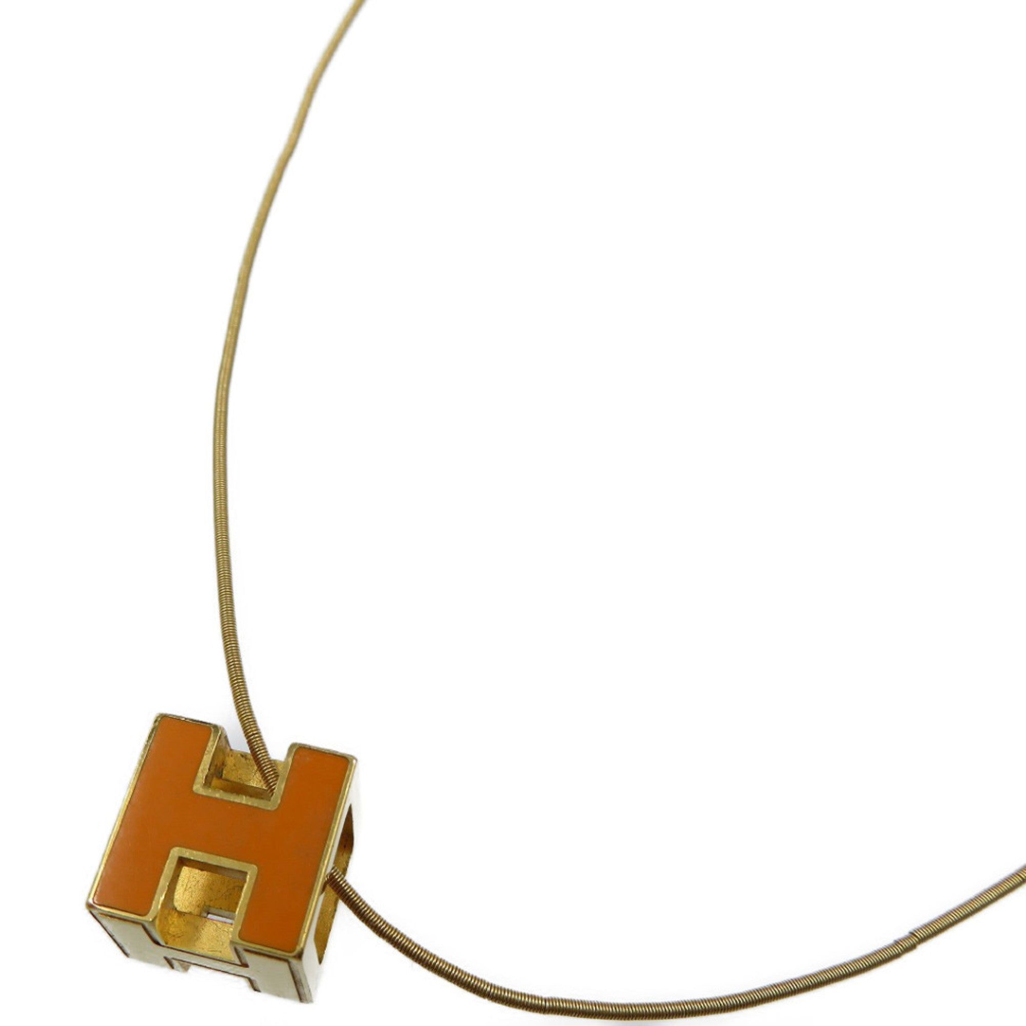 image of Hermes Cage De Ash H Cube Metal Orange Gold Necklace in Black, Women's