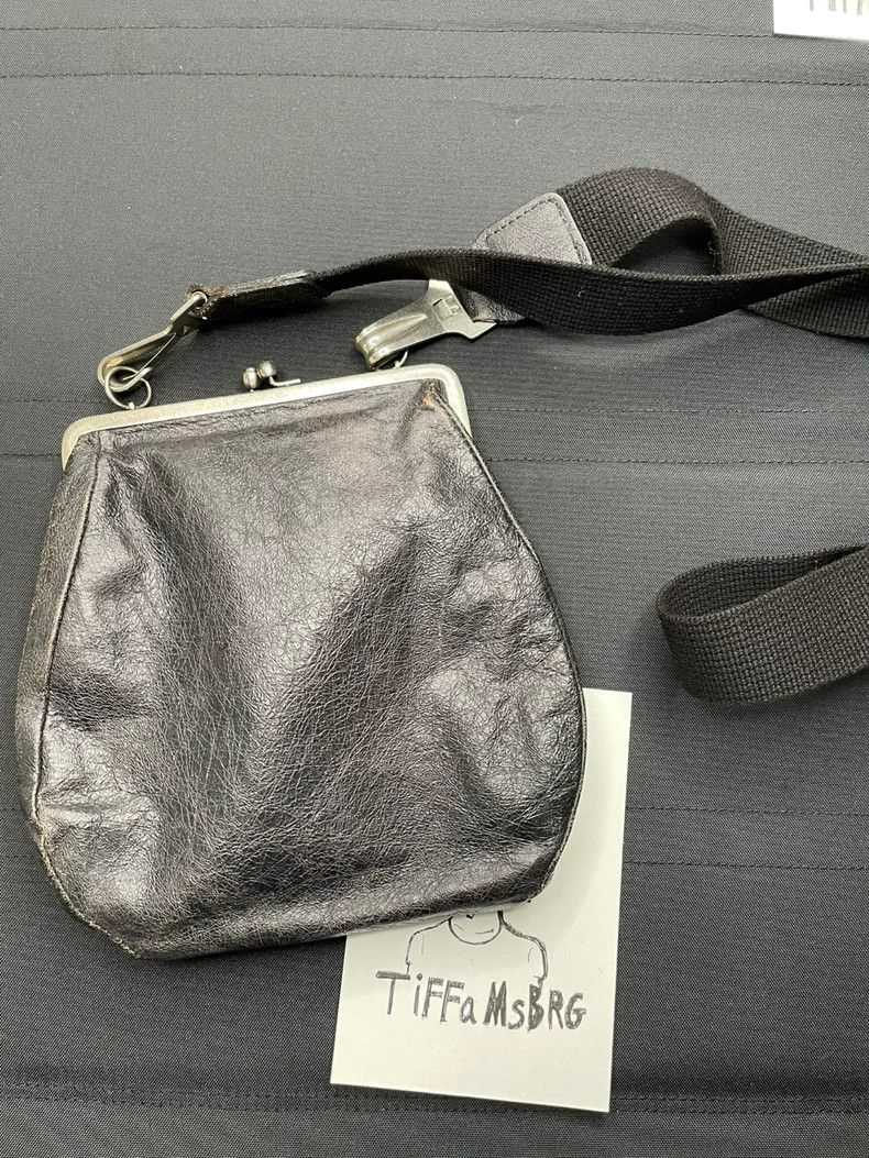 Undercover T period messenger bag