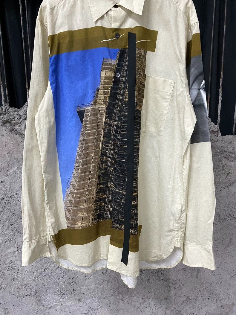 DRIES VAN NOTEN A white long-sleeved shirt coat