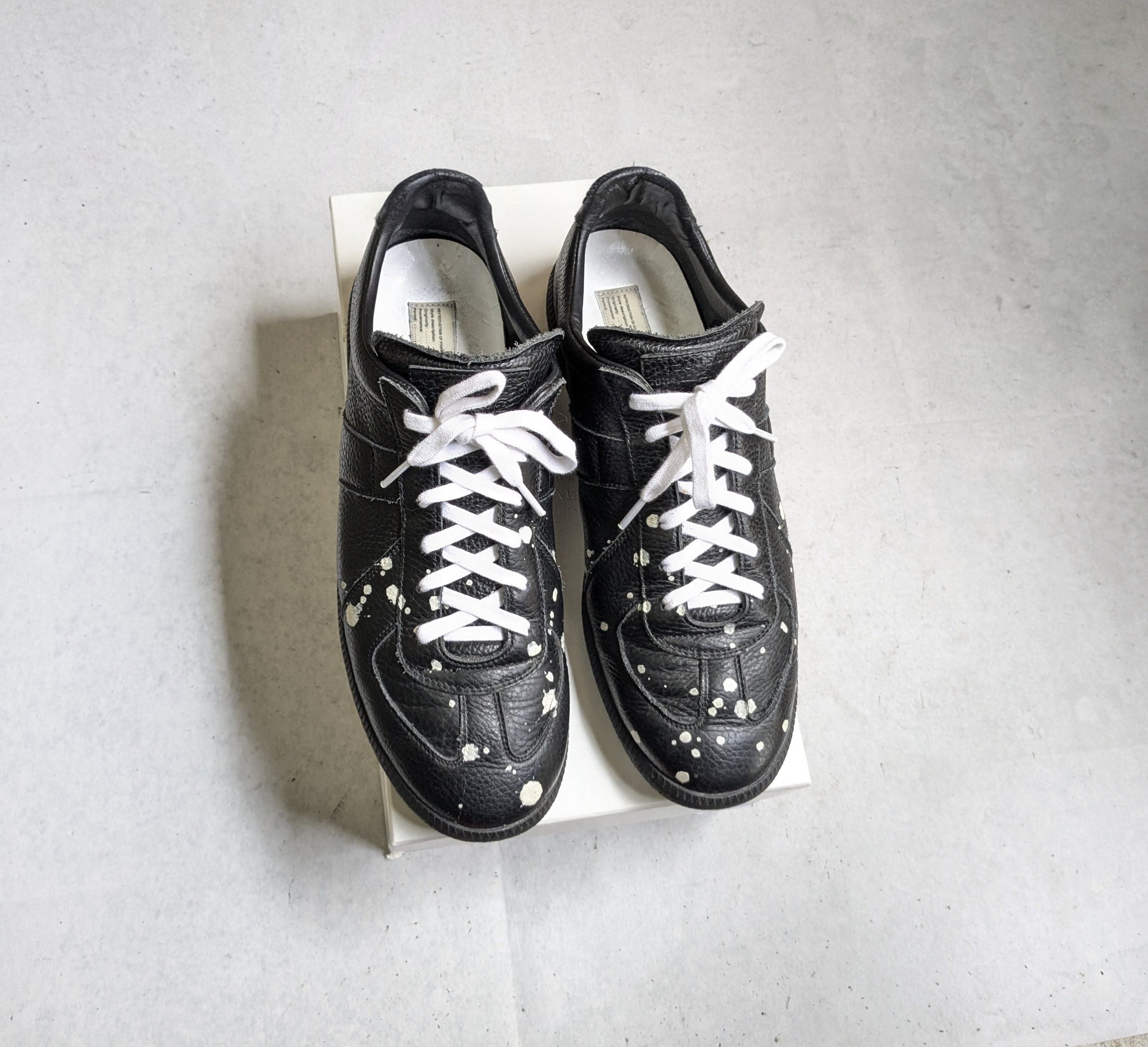 Maison Margiela Maison Margiela Replica GAT Black Paint Splatter 12 45 White Size US 12 / EU 45 - 1 Thumbnail
