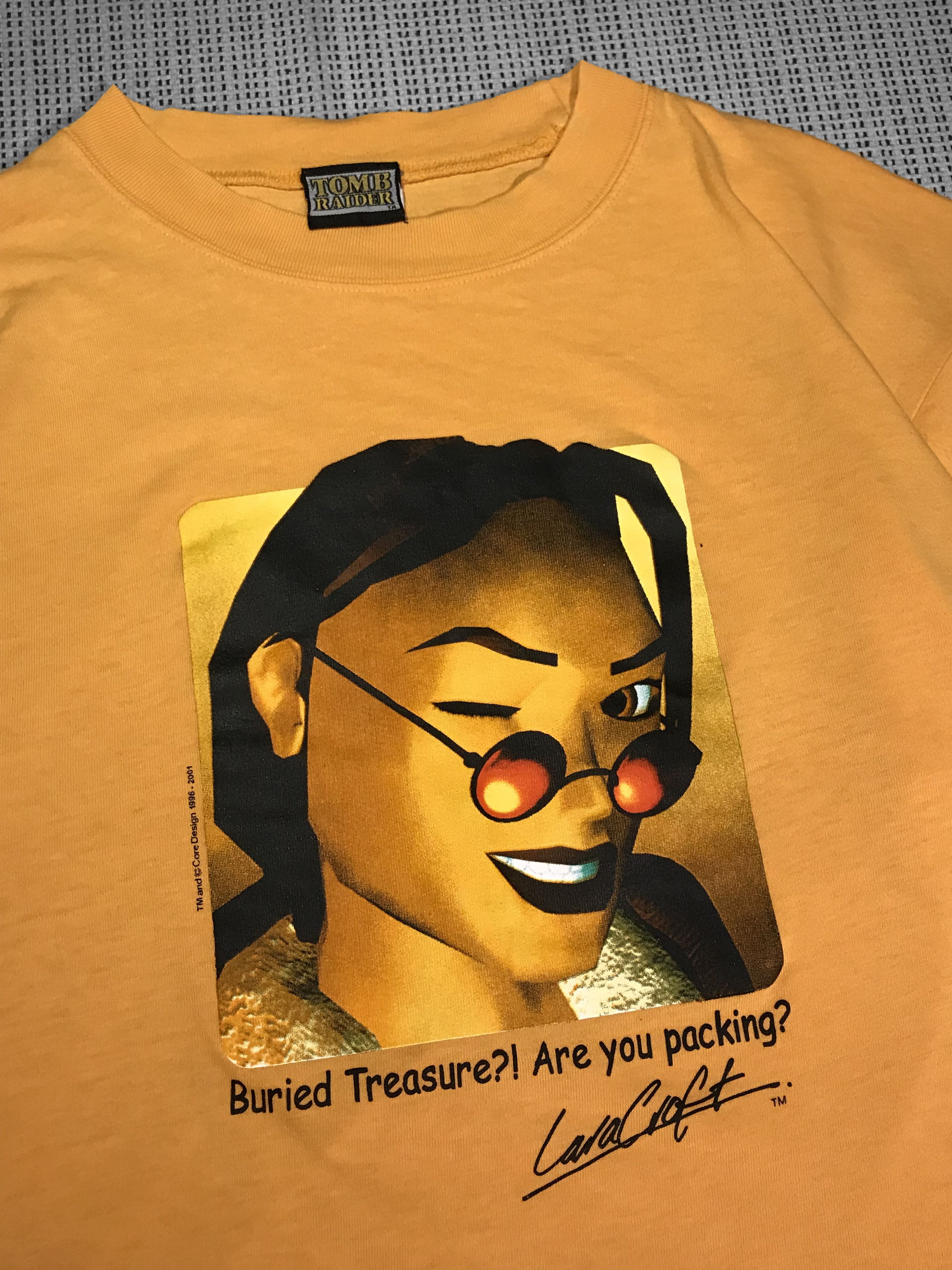 Vintage Vintage yellow T-shirt 1996/2001 Tomb Raider video game (XL) Size US XL / EU 56 / 4 - 2 Thumbnail