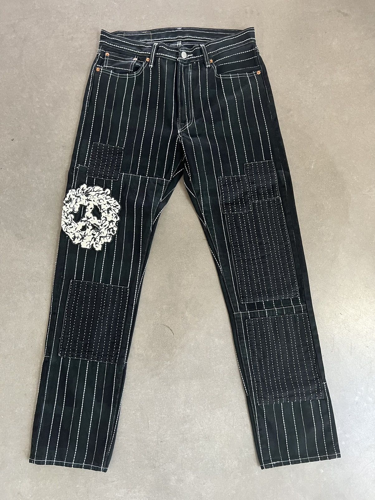 DENIM TEARS x LEVI’S 501 : PEACE PATCHWORK DENIM