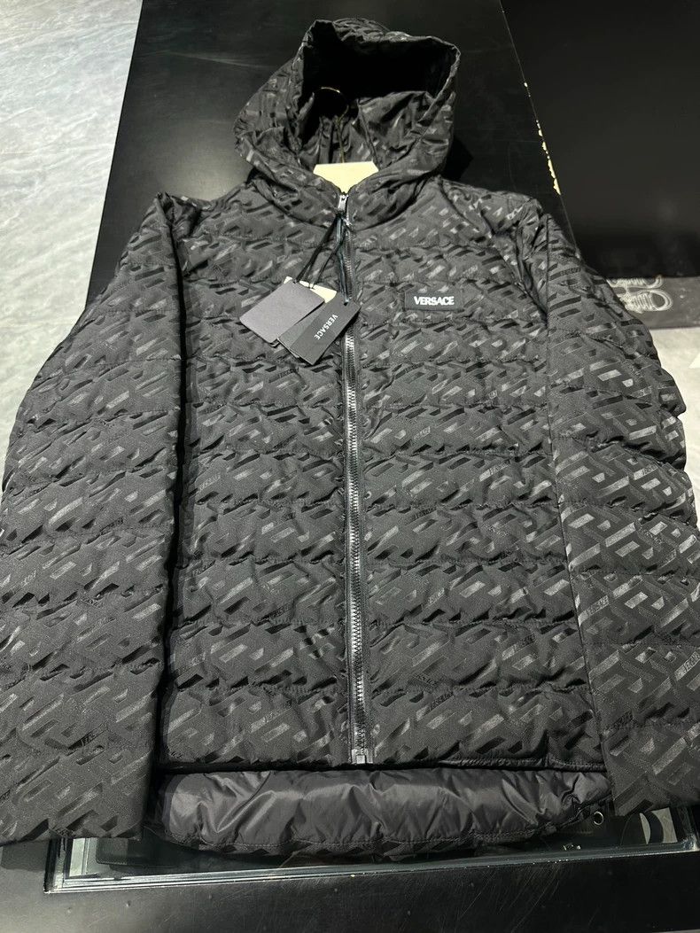 Versace Down jacket with dark patterns full of logo patter