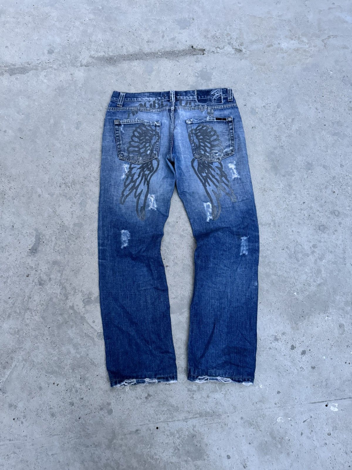 VINTAGE DISTRESSED WINGS DENIM JEANS
