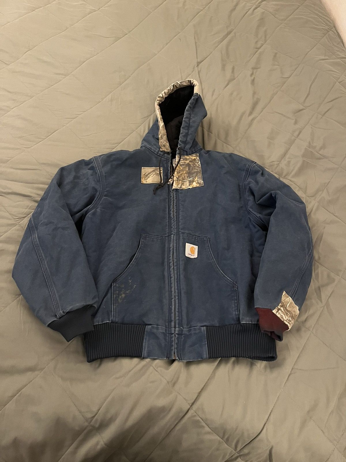 image of Vintage Carhartt Bomber Patched Jacket in Blue, Men's (Size Medium)